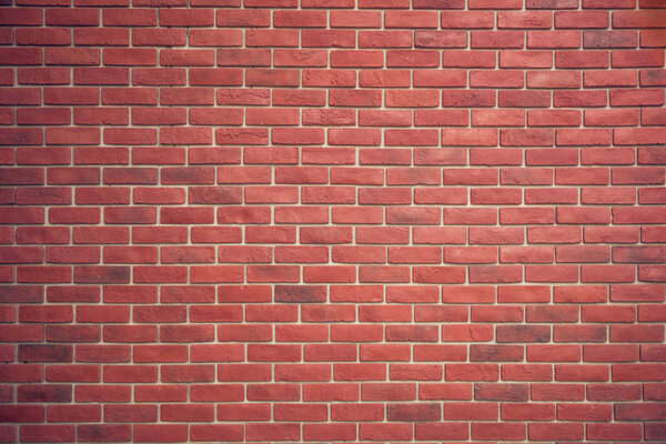 Red brown block brick wall Beautifully arranged texture backgrou