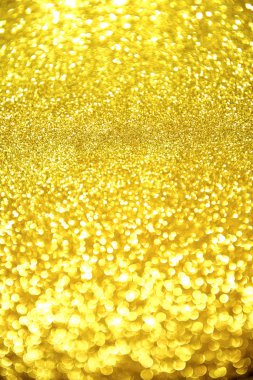 Altın glitter doku doğum günü, yıldönümü, düğün, yeni yıl arifesi ya da Noel için arka plan Derma bulanık.