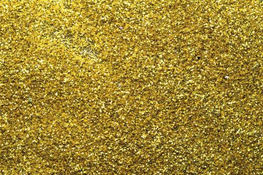 Altın glitter doku doğum günü, yıldönümü, düğün, yeni yıl arifesi ya da Noel için arka plan Derma bulanık.