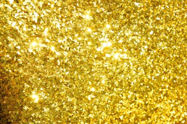 Altın glitter doku doğum günü, yıldönümü, düğün, yeni yıl arifesi ya da Noel için arka plan Derma bulanık.