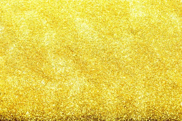 Altın glitter doku doğum günü, yıldönümü, düğün, yeni yıl arifesi ya da Noel için arka plan Derma bulanık.