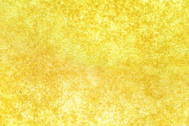 Altın glitter doku doğum günü, yıldönümü, düğün, yeni yıl arifesi ya da Noel için arka plan Derma bulanık.