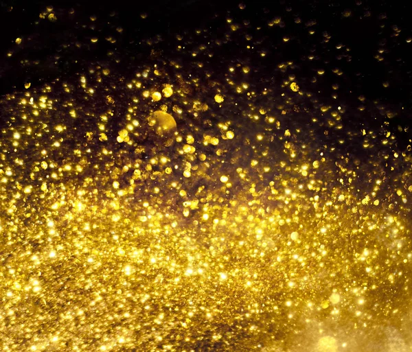 Goldener Glanz Bokeh Beleuchtung Textur verschwommen abstrakten Hintergrund — Stockfoto