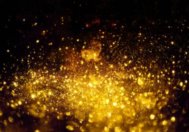 Altın parıltı bokeh aydınlatma dokusu soyut gruplandırılmış