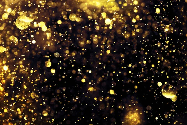 Brillo dorado bokeh textura de la iluminación fondos abstractos borrosos —  Fotos de Stock