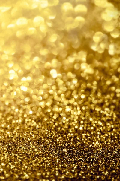 Golden glitter bokeh lighting texture Blurred abstract backgroun — Stock Photo, Image