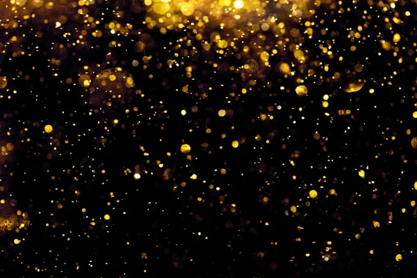 Gouden glitter bokeh verlichting textuur wazig abstract backgroun — Stockfoto