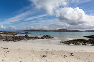 White sand beach Scottish island of Iona Scotland uk Inner Hebrides view to the Isle of Mull clipart