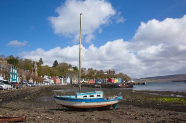 Tobermory west coast of Scotland on Isle of Mull Scottish Inner Hebrides with sailing boat and harbour clipart