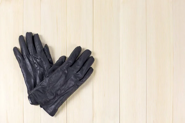 Men's gloves on a light background.