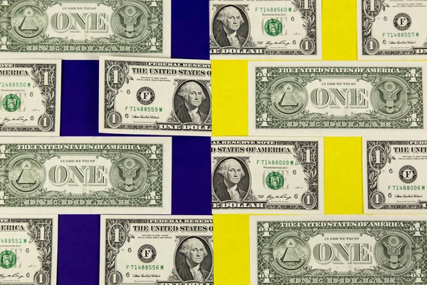 Geld op een blauwe en gele achtergrond. — Stockfoto