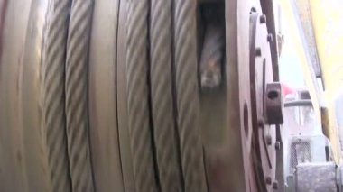 Düğümleri ve çalışma mekanizma Ekskavatör parçaları. Bir ekskavatör ve üzerinde metal kablo yara bir vinç mekanizmasının.