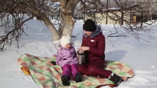 Mom Daughter Drink Tea Thermos Picnic Young Mother Beautiful Little — Stock Video