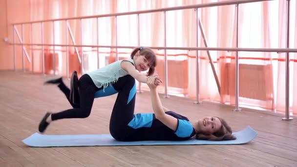 Mom Lifts Her Daughter Legs Lying Her Back Woman Little — Stock Video