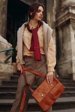 Woman In Fashionable Clothes In Street