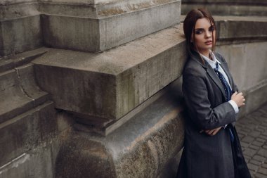 Woman In Fashion Clothes Posing In Street