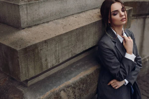 Woman In Fashion Clothes Posing In Street