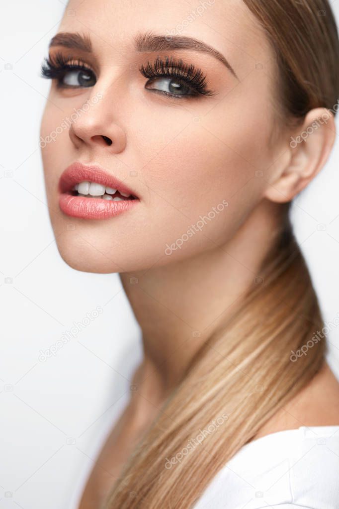 Beauty Woman Face. Beautiful Female With Makeup, Long Eyelashes