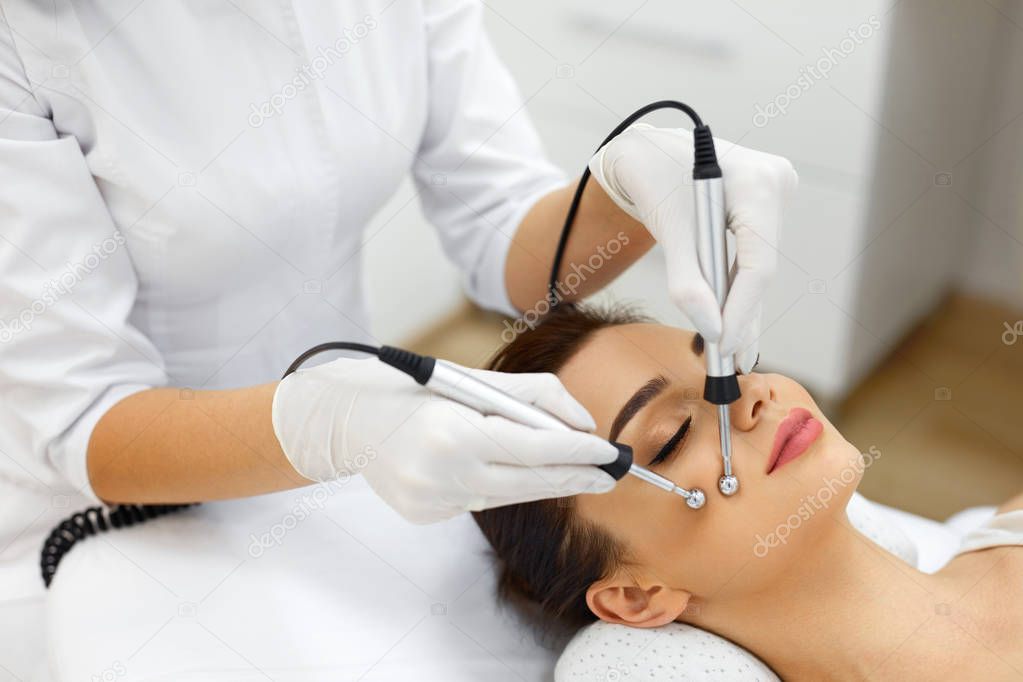 Beauty Treatment At Spa Salon. Microcurrent Therapy For Woman