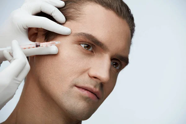 Face Beauty. Portrait Of Handsome Man Getting Facial Injection — Stock Photo, Image