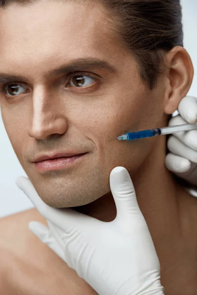 Beauty Injection. Handsome Man Getting Face Filler Injections