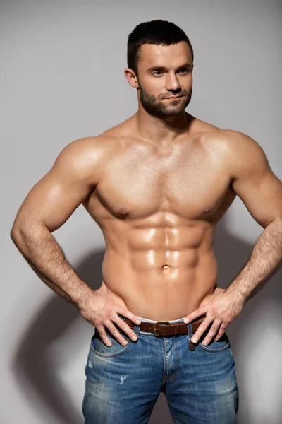 Handsome Smiling Young Man With Sexy Fit Muscular Body Indoors — Stock Photo, Image