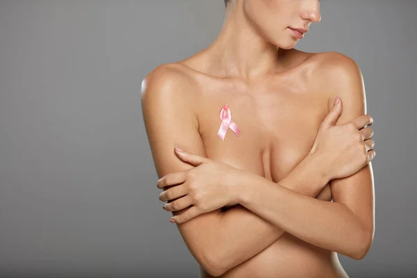 Naked Woman With Breast Cancer Awareness Ribbon On Chest — Stock Photo, Image
