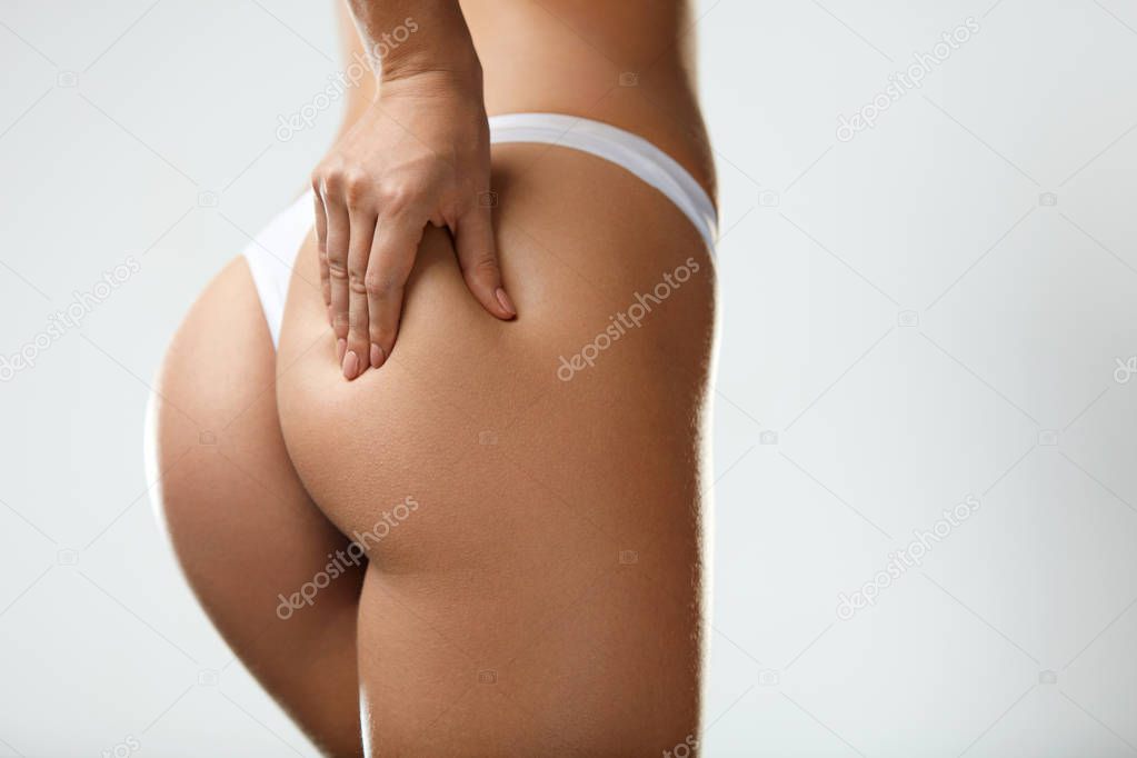 Closeup Beautiful Woman Body In Shape With Firm Butt In Bikini