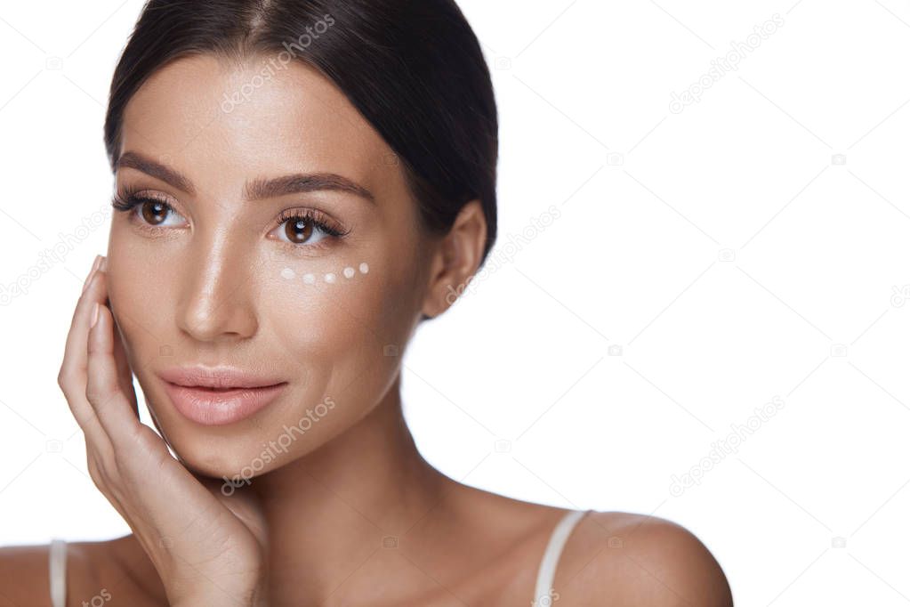 Woman Beauty Face With Concealer Under Eyes And Beautiful Makeup