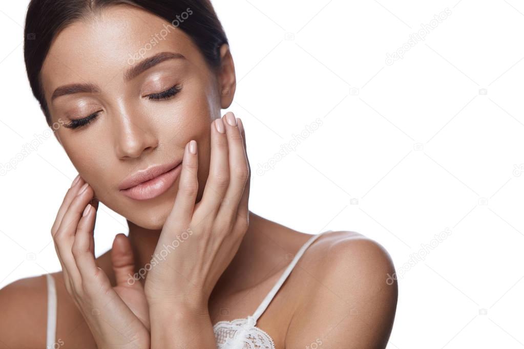 Portrait. Young Woman With Closed Eyes And Hands Touching Face