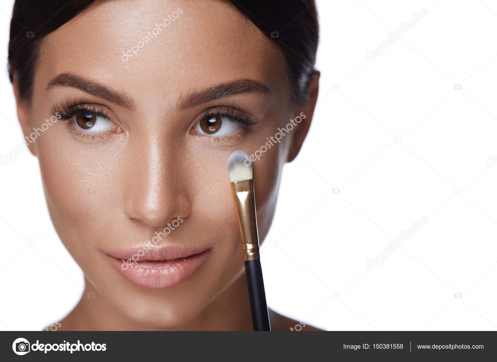 Beauty. Woman Face With Brush. Makeup Cosmetics Stock Photo by ©puhhha