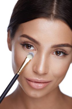 Beauty. Woman Face With Brush.  Makeup Cosmetics clipart