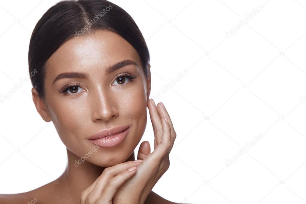 Young Woman With Smooth Soft Skin Touching Face. Skin Care