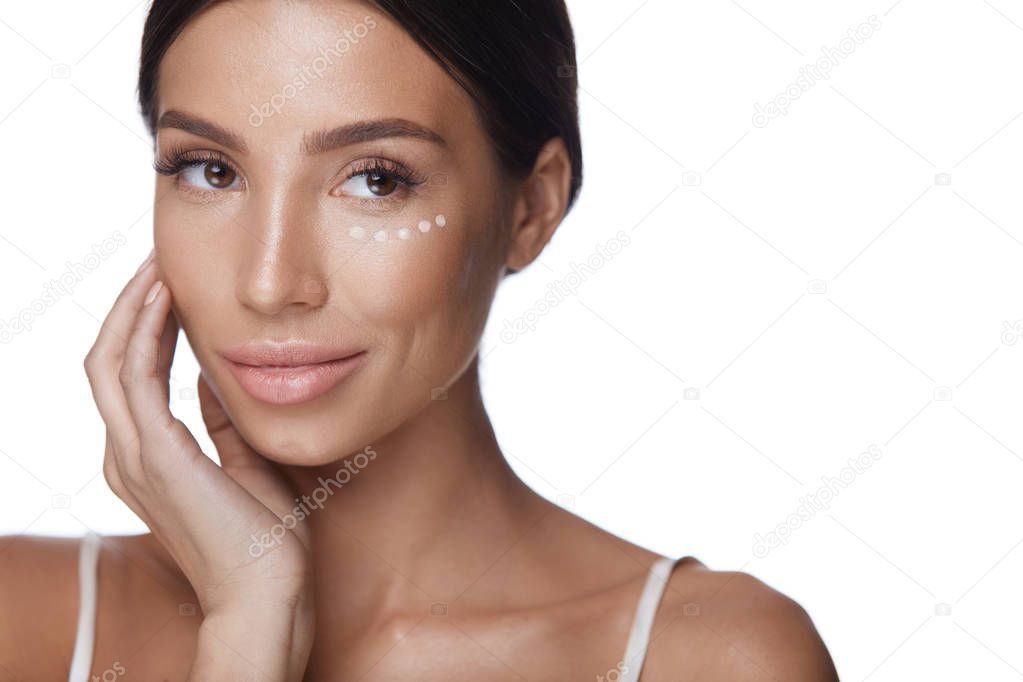 Woman Beauty Face With Concealer Under Eyes And Beautiful Makeup