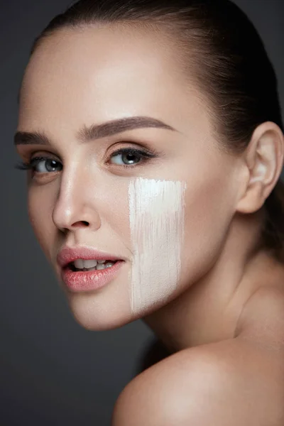 Attractive Young Woman With Stripe Of Foundation On Face — Stock Photo, Image