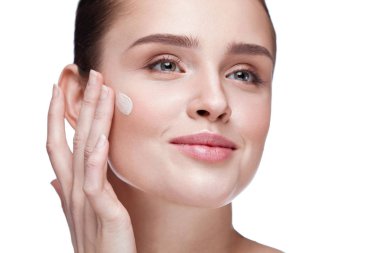 Face Makeup. Sexy Woman Applying Foundation Cream On Skin clipart