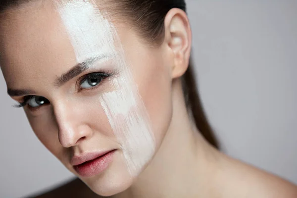 Cosmetics. Portrait Of Sexy Girl With Foundation Line On Face