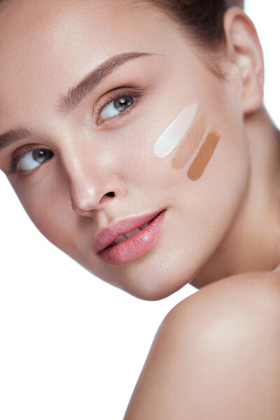 Makeup. Young Woman With Three Kinds Of Foundation On Skin