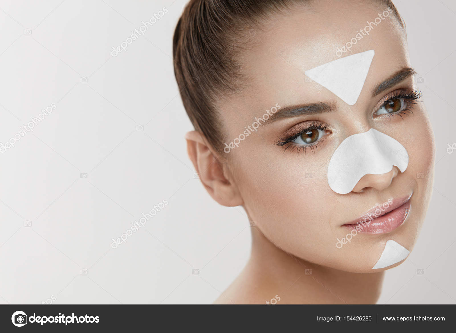 Skin Cleansing Girl With Patches On Forehead Nose And Chin