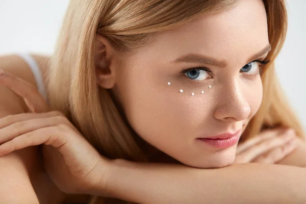 Skin Beauty. Closeup Beautiful Girl With Cream On Skin Under Eye — Stock Photo, Image