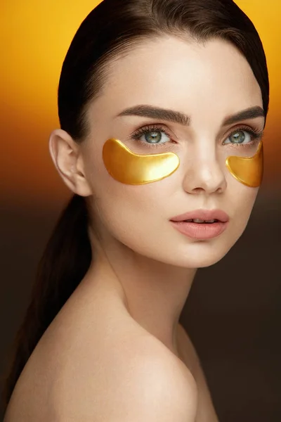 Woman Beauty Face With Mask Under Eyes