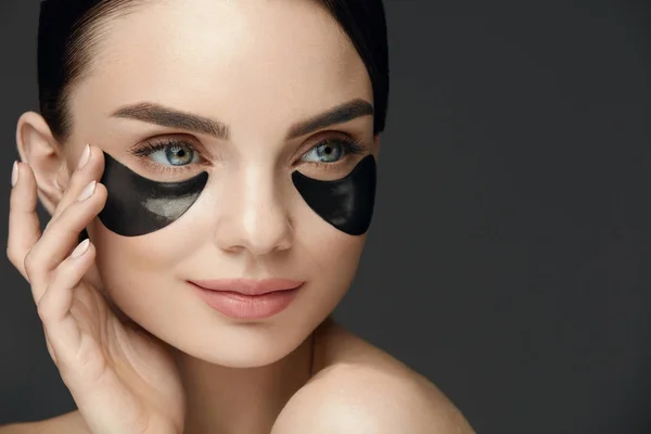 Woman Beauty Face With Mask Under Eyes