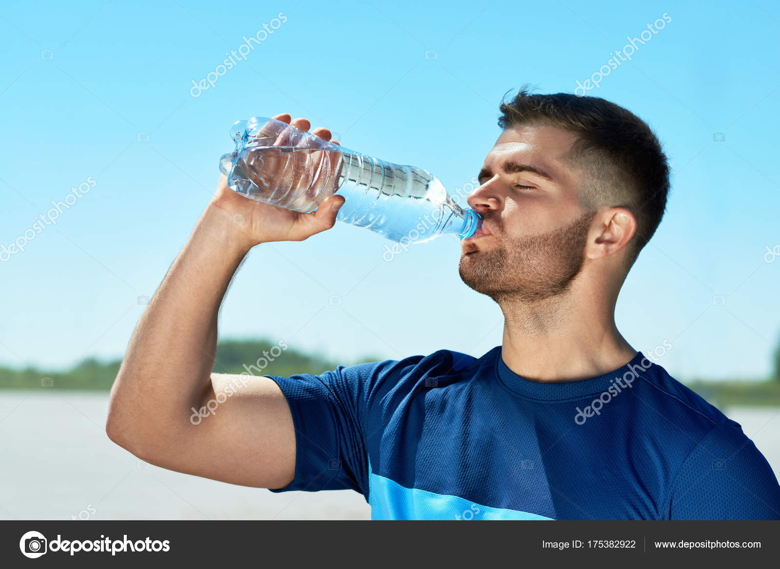 Man Drinking Water After Running. Portrait. Stock Photo by ©puhhha 175382922