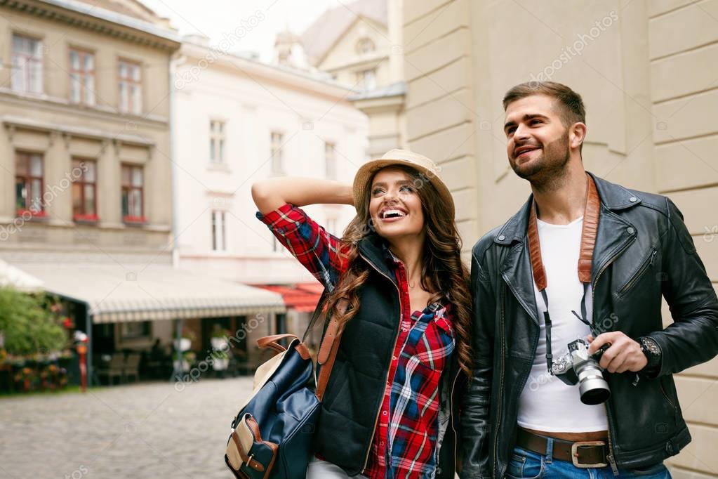 Tourist Couple Traveling And Enjoying Architecture