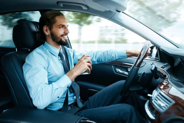 Portrait Of Business Man Driving Car