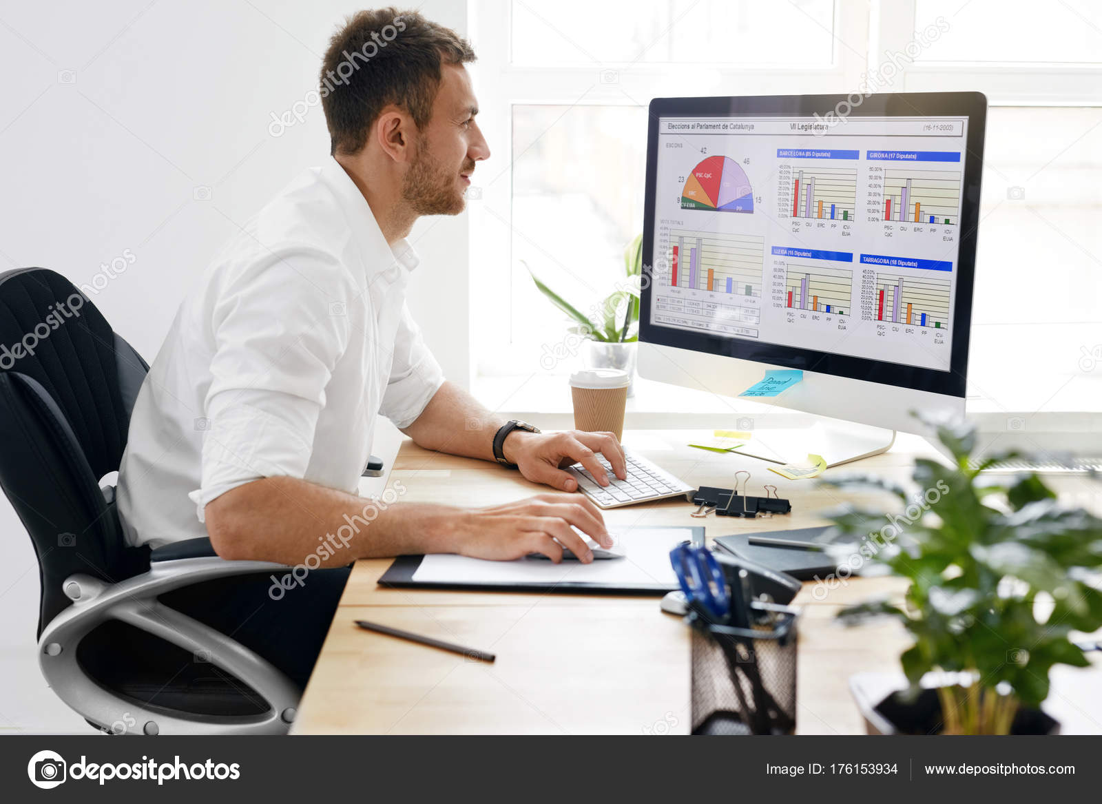 Young Business Man Working On Computer In Office Stock Photo By