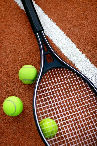 Sport. Tennis Balls And Racket On Court