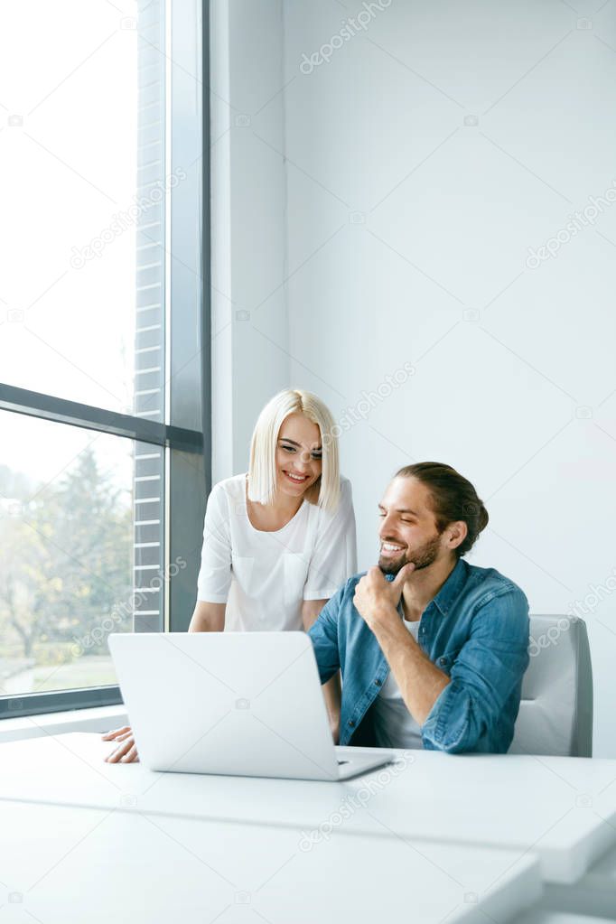 Business People In Office. Man And Woman Working, Sharing Idea.