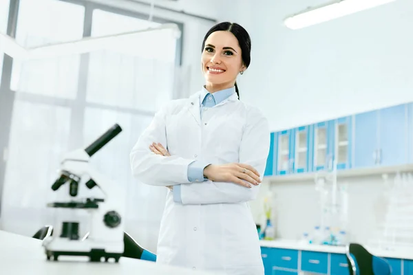 Scientist In Laboratory. Female Doctor At Work