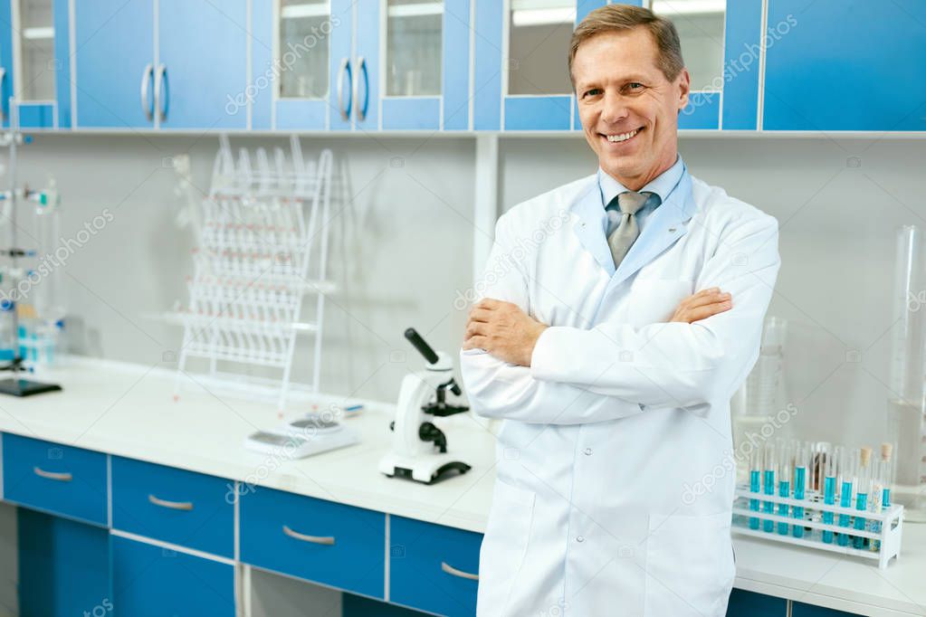 Male Scientist In Laboratory Portrait